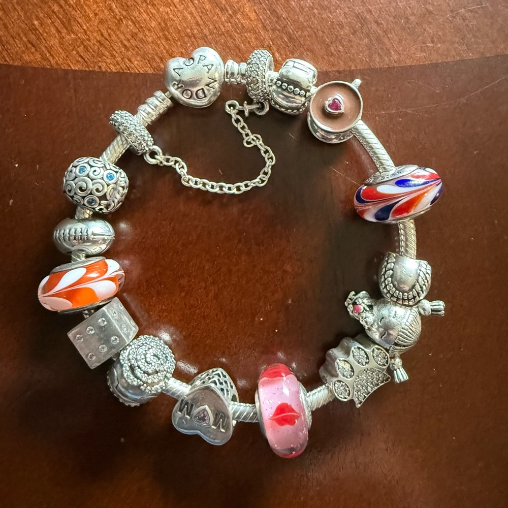 Pandora Silver Bracelet with assorted charms 7.5 inch